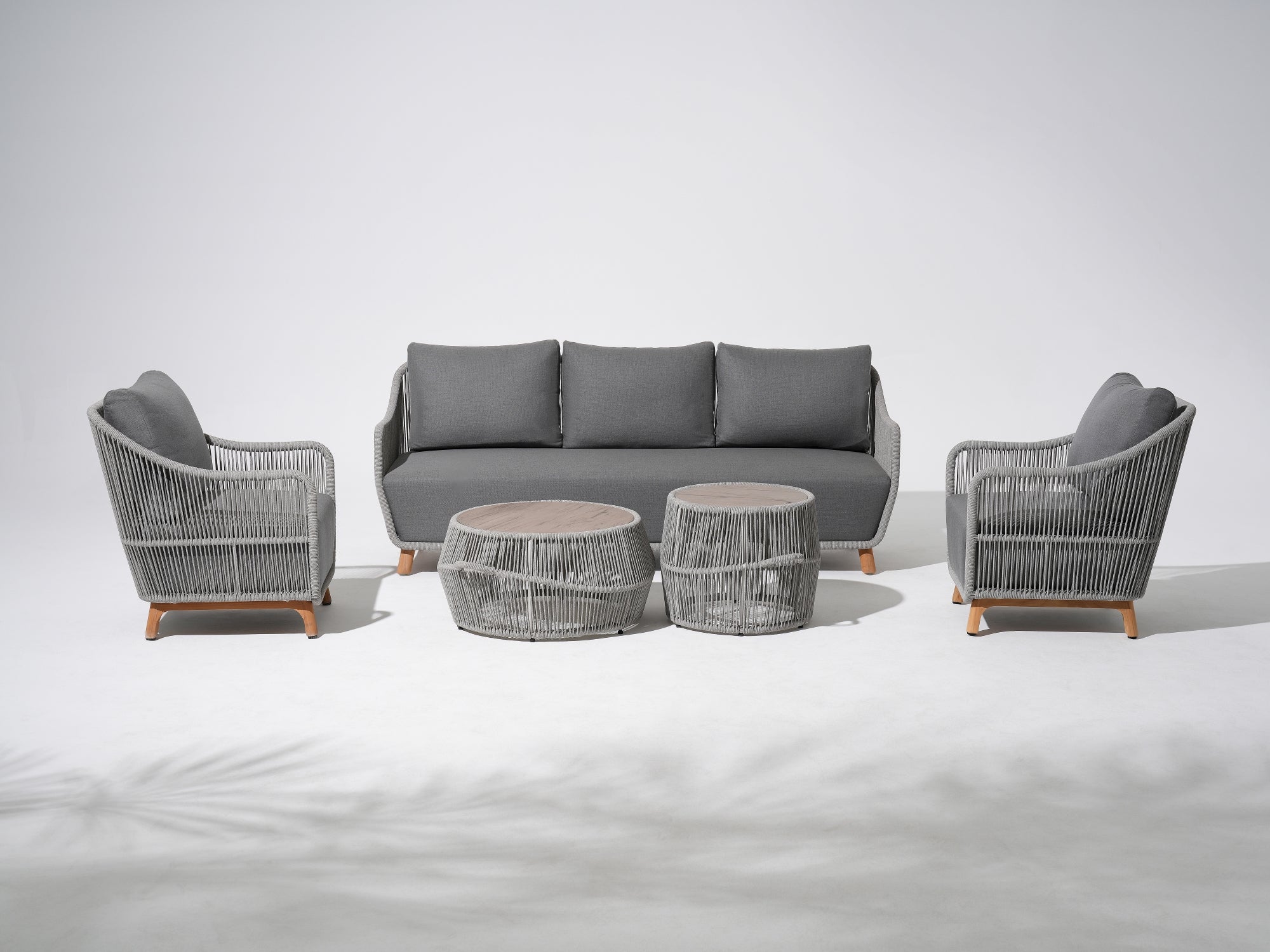 5-pcs Outdoor seating conversation set with gray seat cushions and back cushions, a 3-seat sofa, two single sofa armchairs with gray rope design, two round outdoor coffee tables with the same rope design - Sunsitt Premium Modern Outdoor Patio Furniture Set