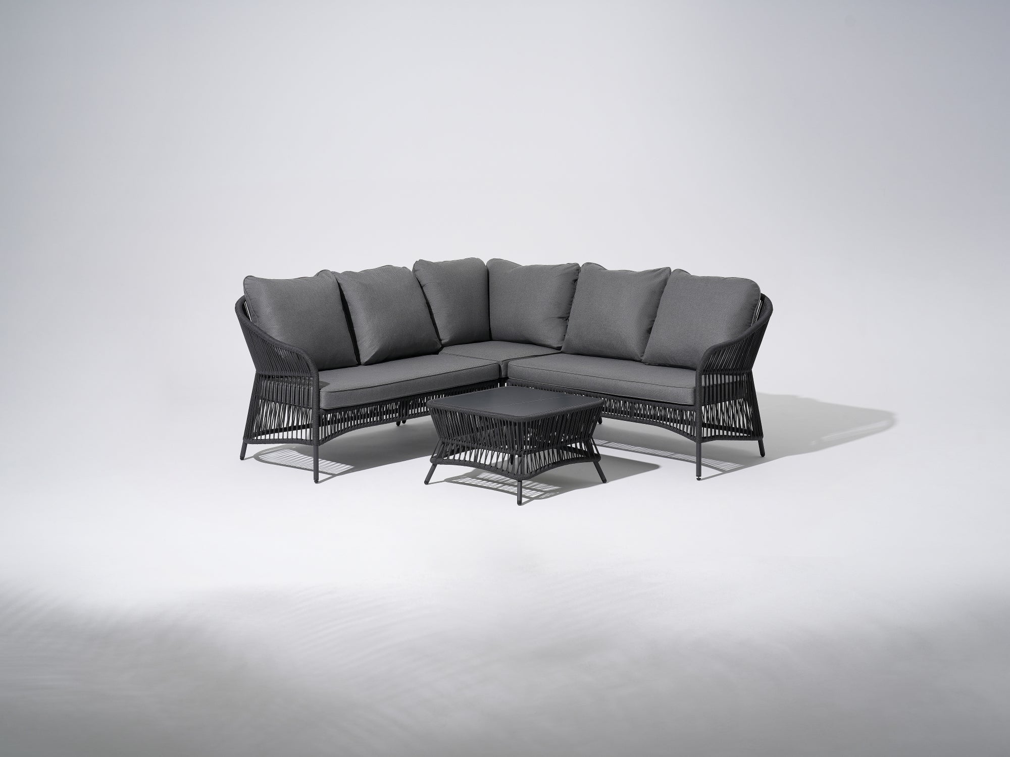 4-seat L-shaped outdoor sectionals, black Aluminum patio conversation set with black rope design and gray cushions, a square coffee table with black rope design - Sunsitt Premium Modern Outdoor Patio Furniture Set